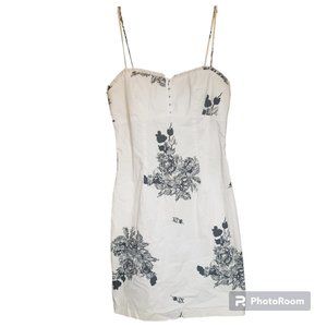White summer dress with black floral print.